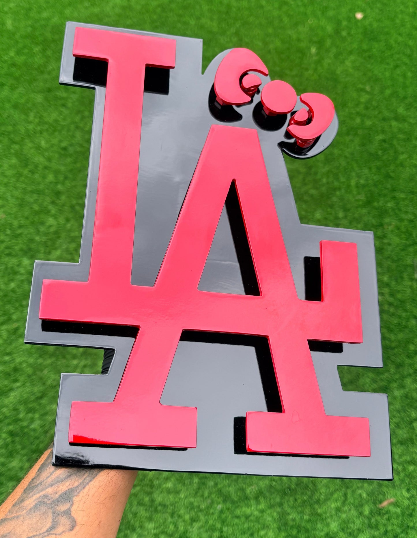 LA LOGO WITH HK BOW